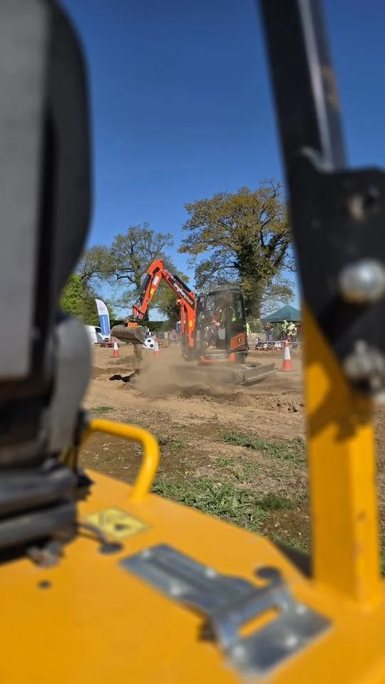 Mini excavator taking part in the Trench Wars digging challenge